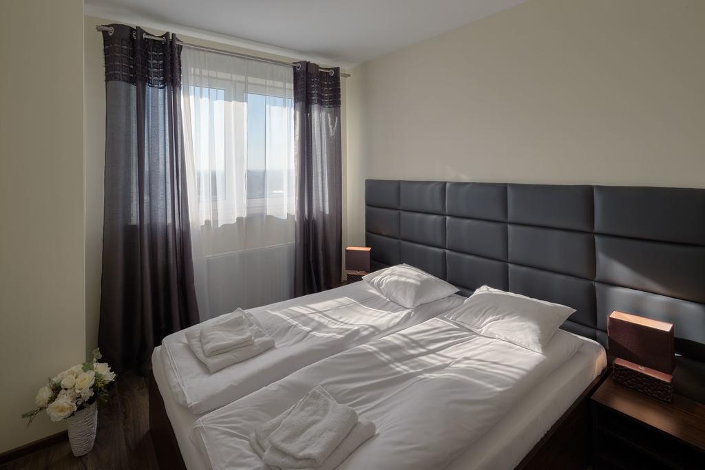 City Aparthotel Ochota Warszawa Værelse billede